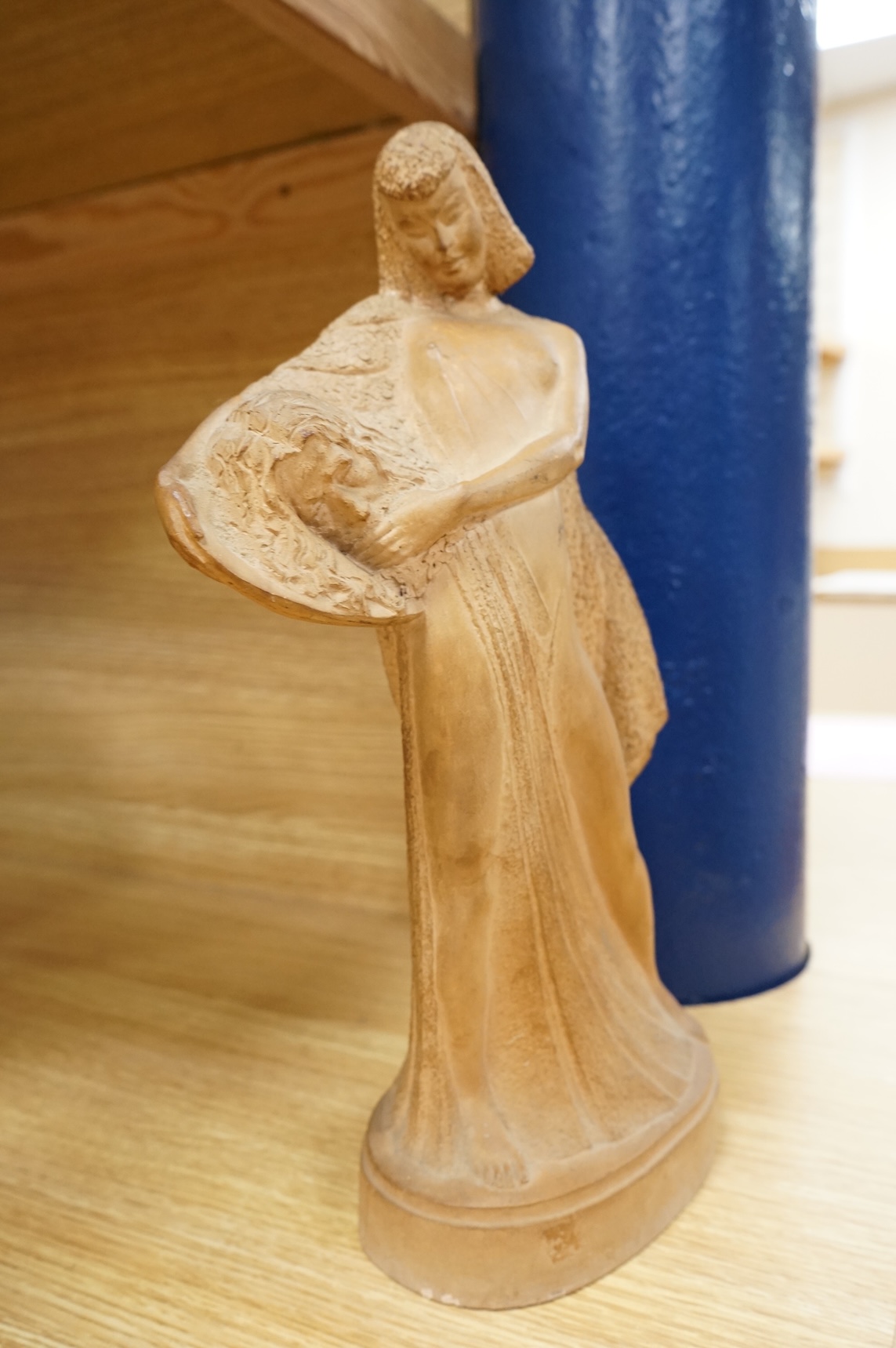 ZFW, a terracotta figure of a classical maiden, signed and dated ‘43, 36cm high